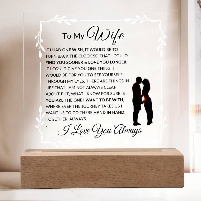 Cordless romantic soulmate LED acrylic lamp displayed on bedroom nightstand at night