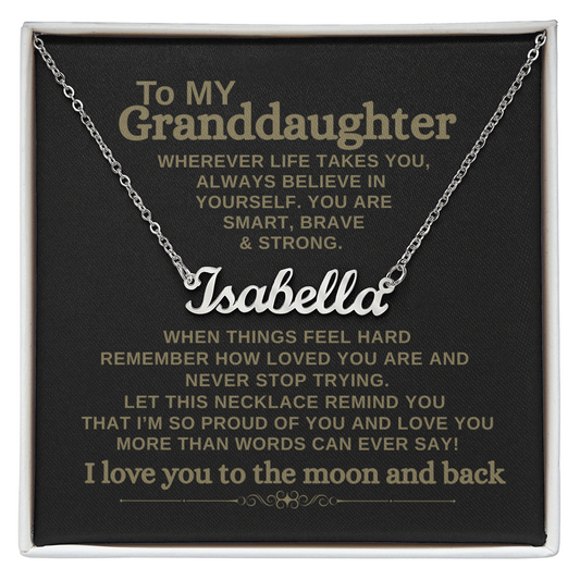 To My Granddaughter custom name necklace with personalized message card on black and gold background.