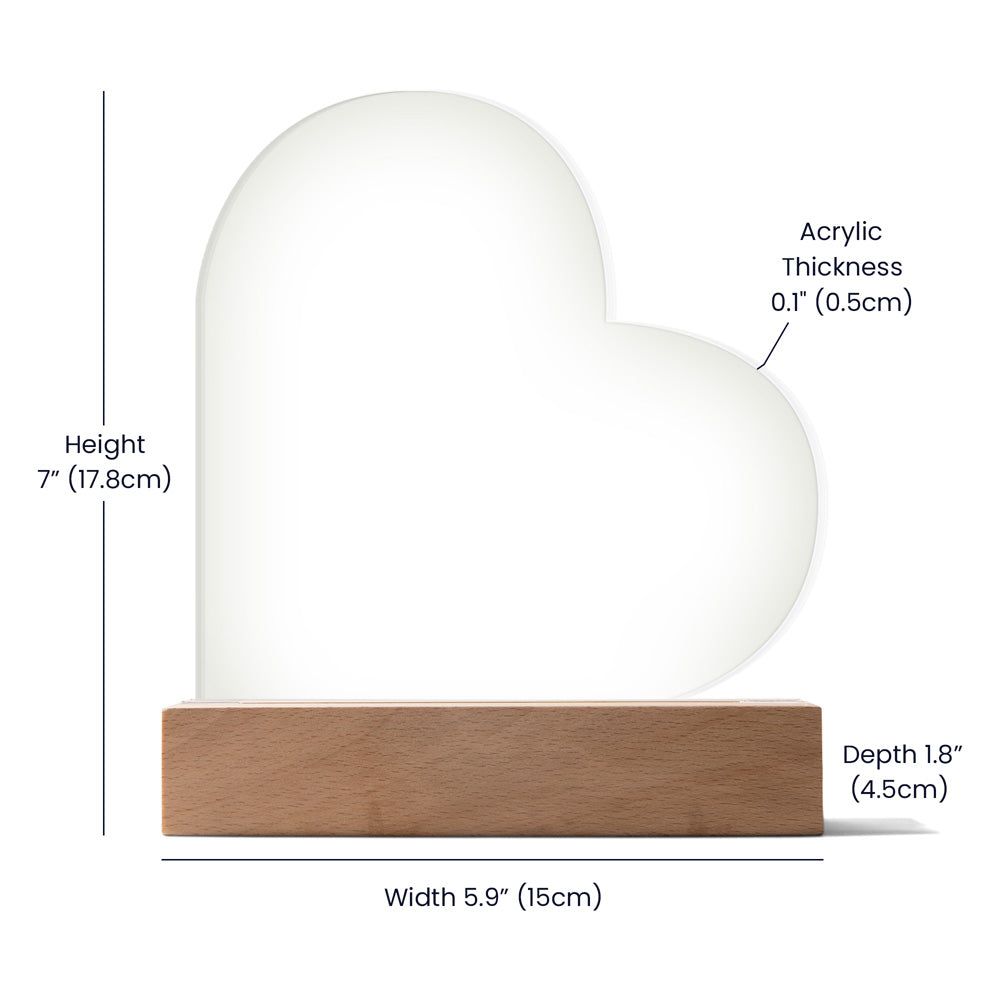 Shows specs of the crystal clear heart shape acrylic lamp Size: 6.5" (16.5cm) height × 5.9" (15cm) width × 1.8" (4.5cm) depth 
