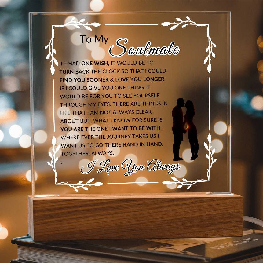 Romantic soulmate LED acrylic lamp displayed on bedroom nightstand at night