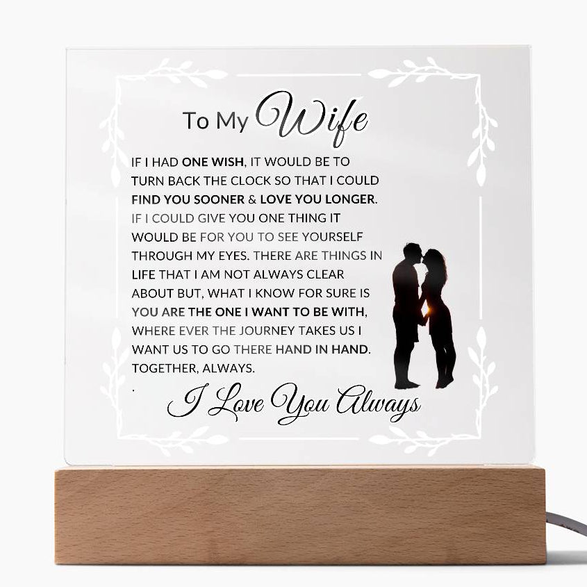 An LED acrylic lamp with a wooden base, featuring a quote about love and commitment to a soulmate. Corded
