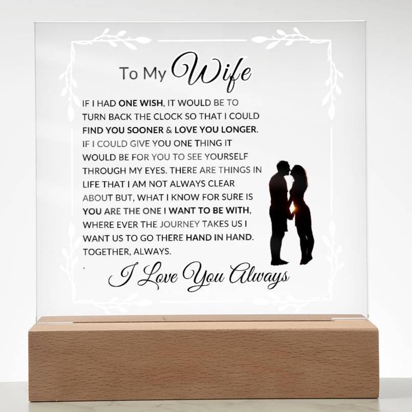 An LED acrylic lamp with a wooden base, featuring a poem dedicated to a wife with vibrant printed design on the acrylic plaque.